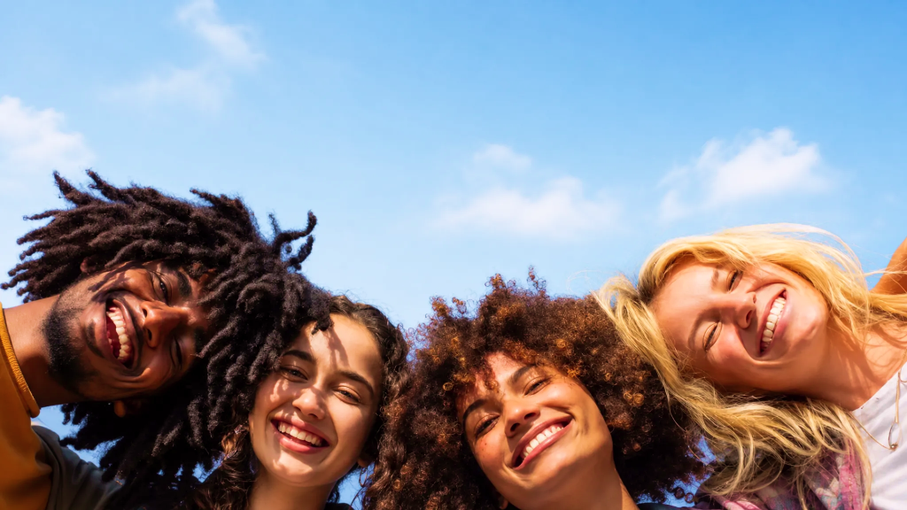 Group of people smiling outdoors